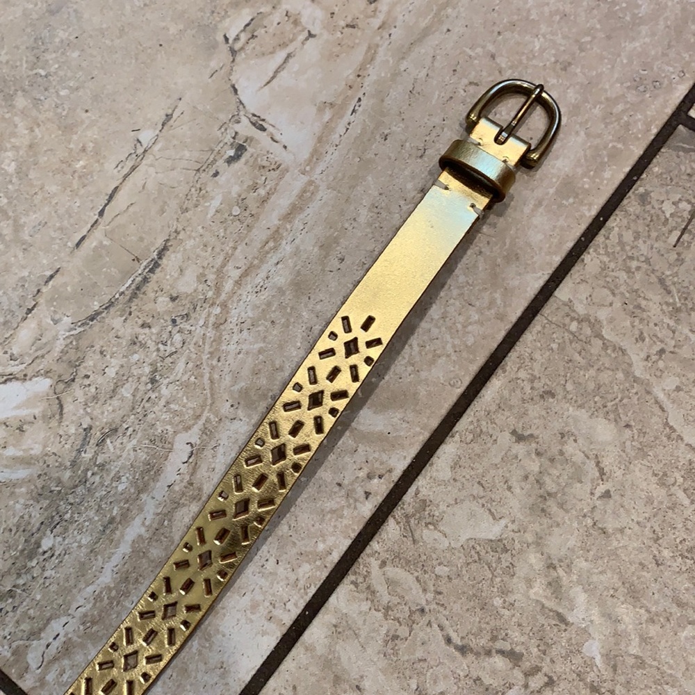 Gold cutout belt.